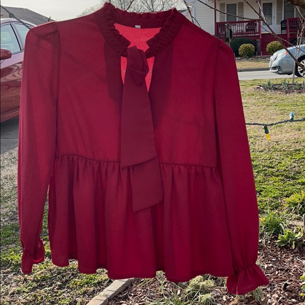 Beautiful red long sleeve peplum blouse